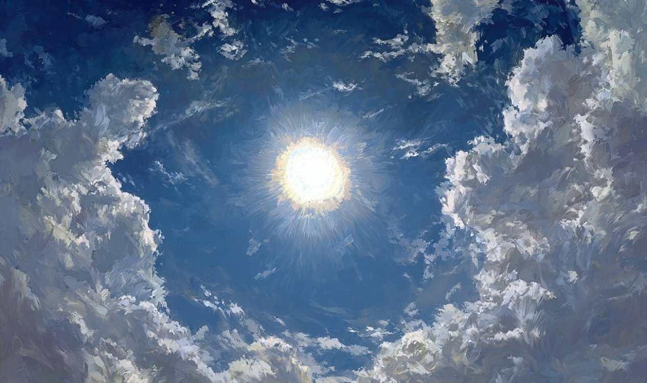 The sun shining through a hazy sky